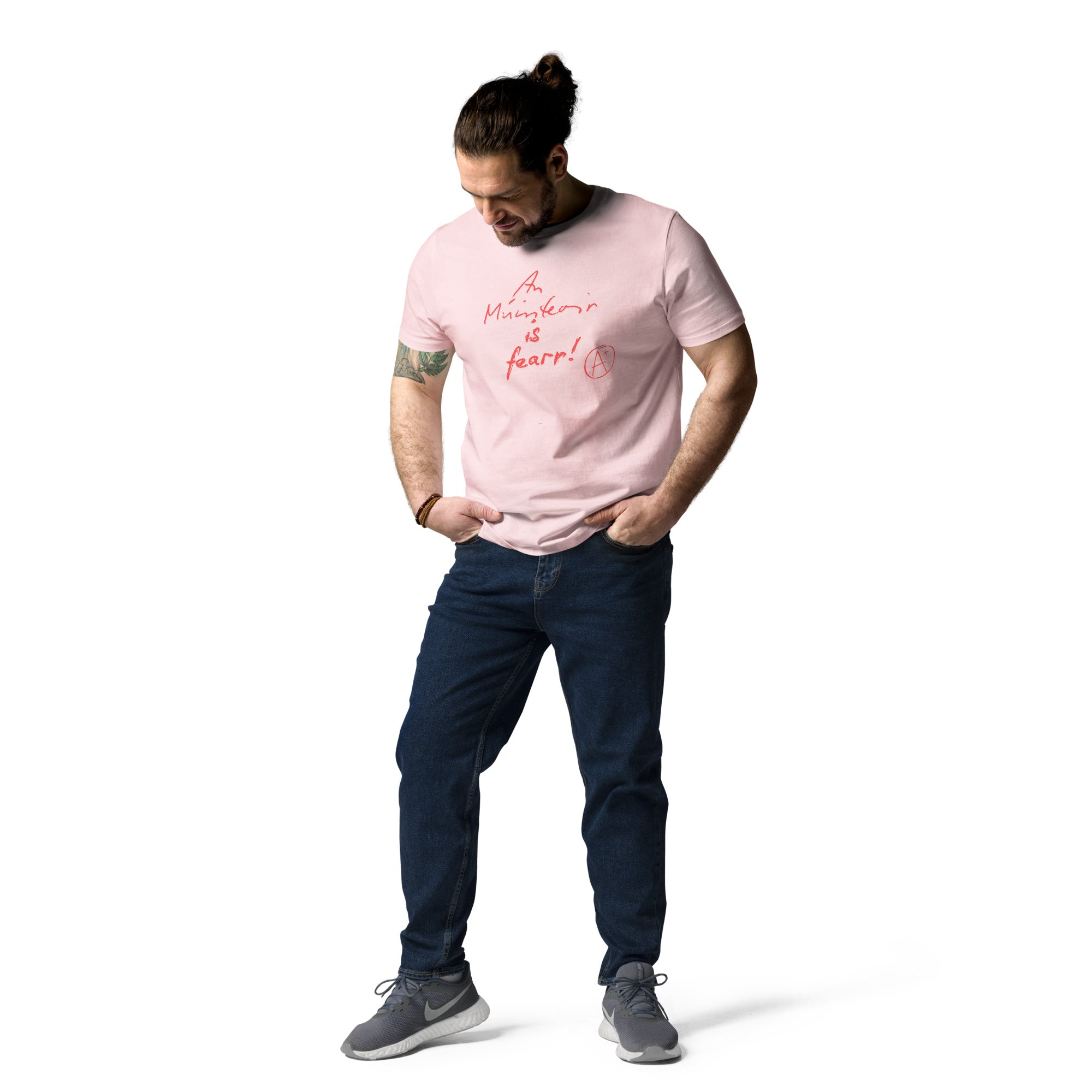 
Funny Irish slogan T-shirt in pink with ‘An muinteoir is fearr’ text