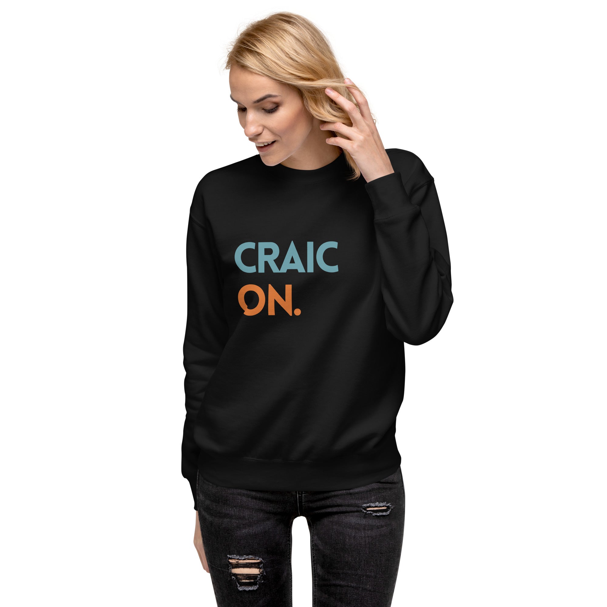 Funny Irish slogan jumper in black with ‘Craic on’ text
