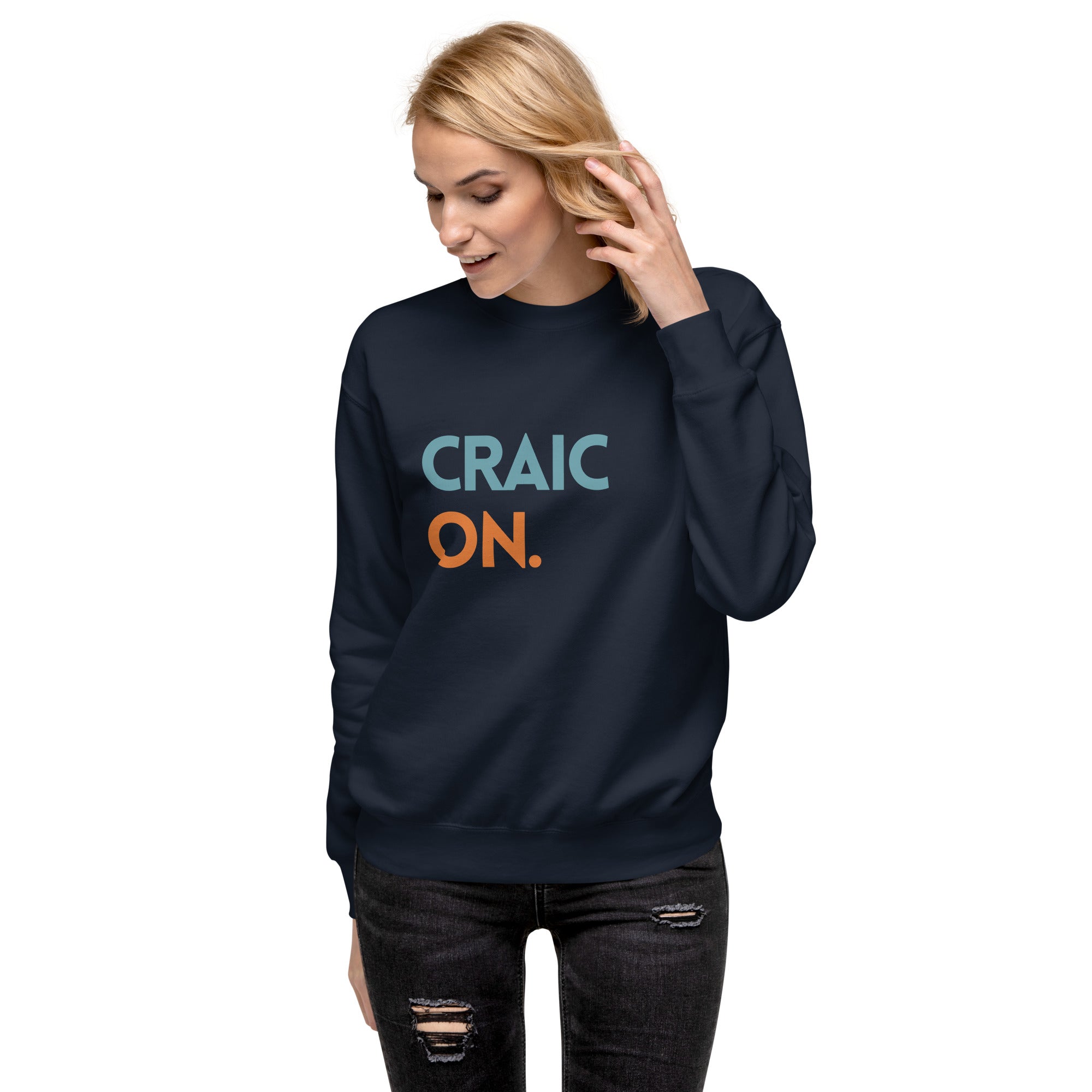 
Funny Irish slogan jumper in navy with ‘Craic on’ text